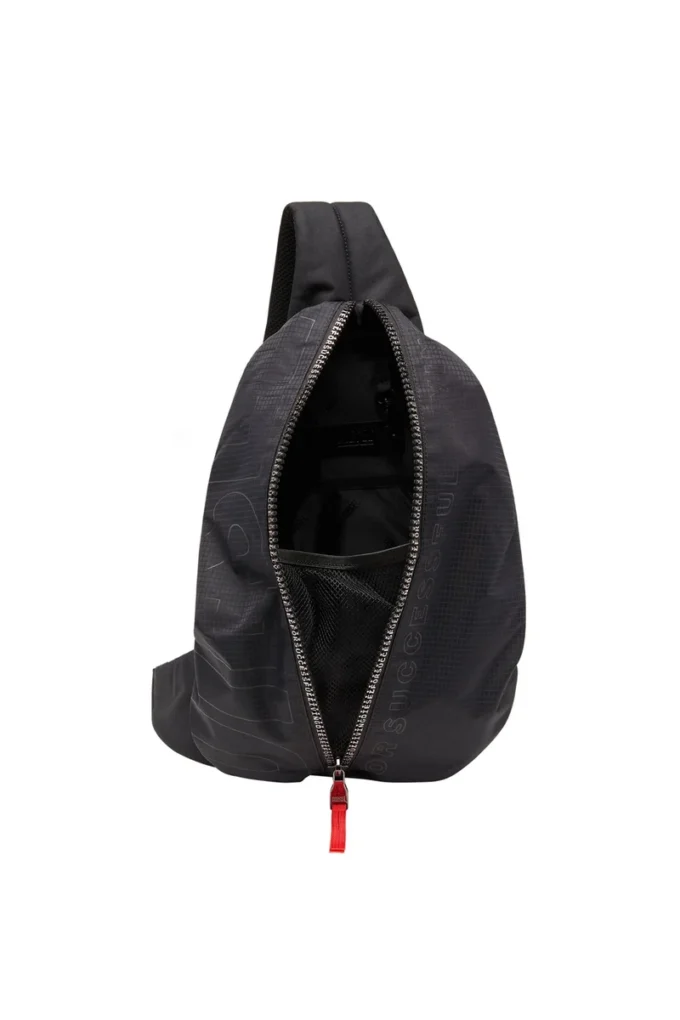 Borsa a tracolla zip-d x Zaino Zip-D-Sling in tessuto jacquard a quadri Borsa a tracolla zip-d x Zaino Zip-D-Sling in tessuto jacquard a quadri