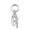 charm-oval d Ciondolo con charm a forma di D ovale charm-oval d Ciondolo con charm a forma di D ovale