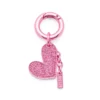 ciondolo-cuore Ciondolo a forma di cuore in metallo con strass