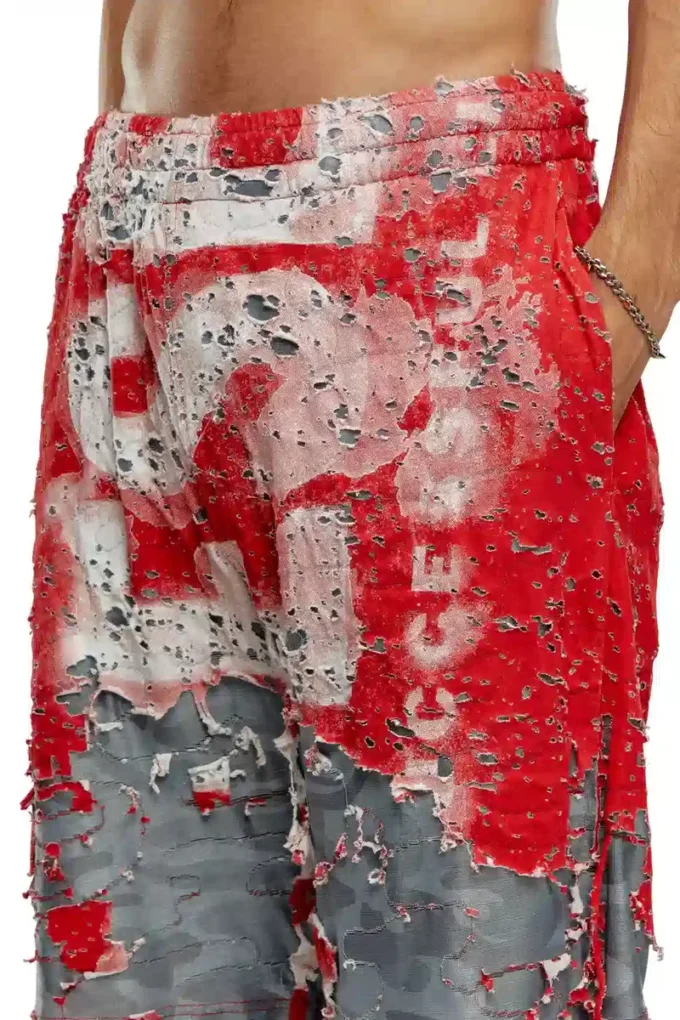 Pantaloncini con logo p-eel in jersey effetto consumato Pantaloncini con logo p-eel in jersey effetto consumato