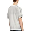 t-riven T-shirt in cotone morbido con spruzzi di colore